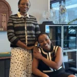 HOPE MURERA AND MIRRIAM MUENI in Hope's Board Room.